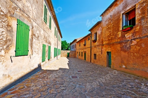Preview: Narrow Street With Old Buildings In Italian City