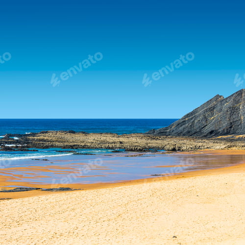 Preview: Portuguese Atlantic Ocean Beach In The Morning Mist At Sunrise. Breathtaking Landscape And Nature