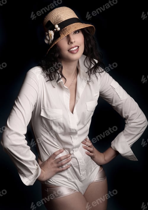 Preview: Stylish Woman Posing with a Hat and Shirt