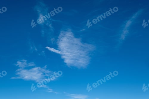 Preview: White Fluffy Cirrus And Cirrocumulus Clouds In Deep Blue Azure Sky. Summer Good Weather Concept