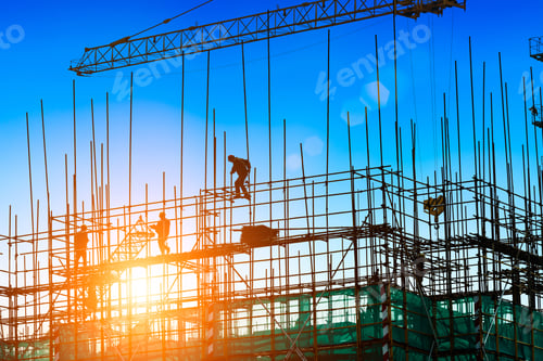 Preview: Construction Site With Crane And Workers At Sunset