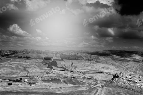 Preview: Landscape Of Sicilian Hills At Sunrise. Asphalt Road Elevated By Columns Due Of Frequent