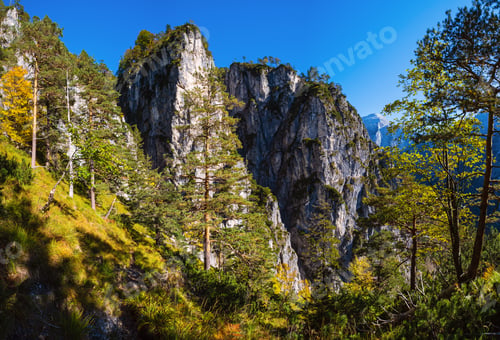 Preview: Sunny Idyllic Colorful Autumn Alpine Scene. Peaceful Rocky Mountain View From Hiking Path Near