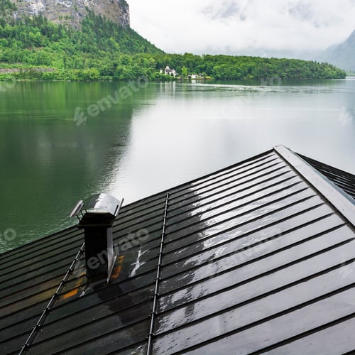 Preview: Rain And Clouds On The Hallstattersee In Austria. Morning Mist Over The Austrian Landscape With