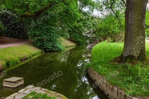 Preview: Water Ditch Channel On Grassy Meadow In Summer City Park