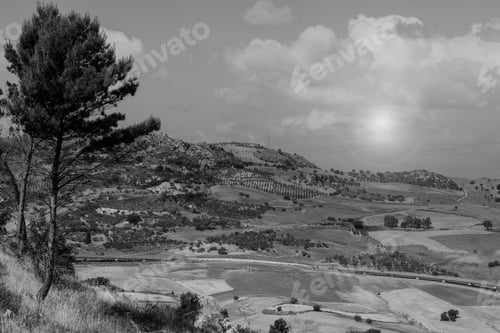 Preview: Landscape Of Sicilian Hills At Sunrise. Asphalt Road Elevated By Columns Due Of Frequent