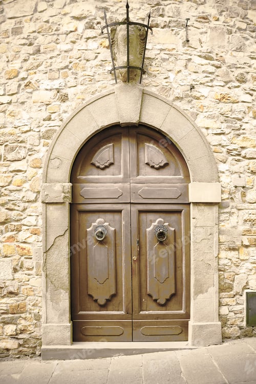 Preview: Traditional Old Vintage Wooden Door And Grunge Wall In Tuscany, Italy. Retro Style