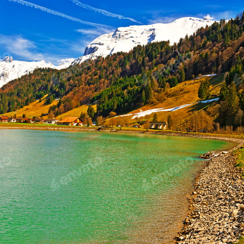 Preview: Mountain Lake On The Background Of Snow-Capped Alps In Switzerland