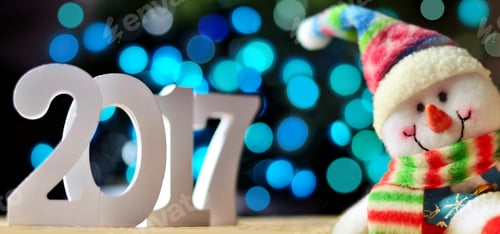 Preview: Christmas Background With Sign 2017 And Snowman On A Blue Background. Happy New Year.