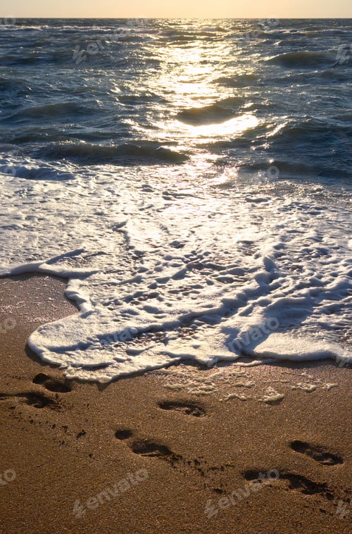 Preview: Coast, Surf And Evening Sunlight Path On Sea Water Surface