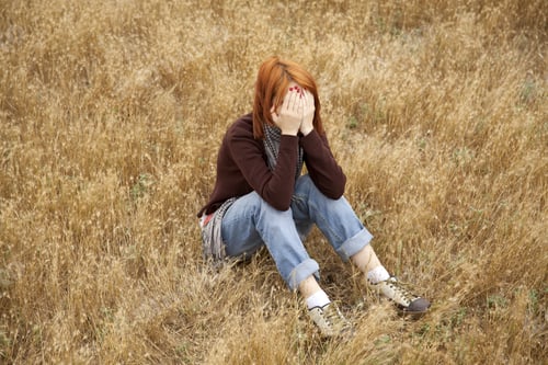 Preview: Lonely Sad Red-Haired Girl At Field