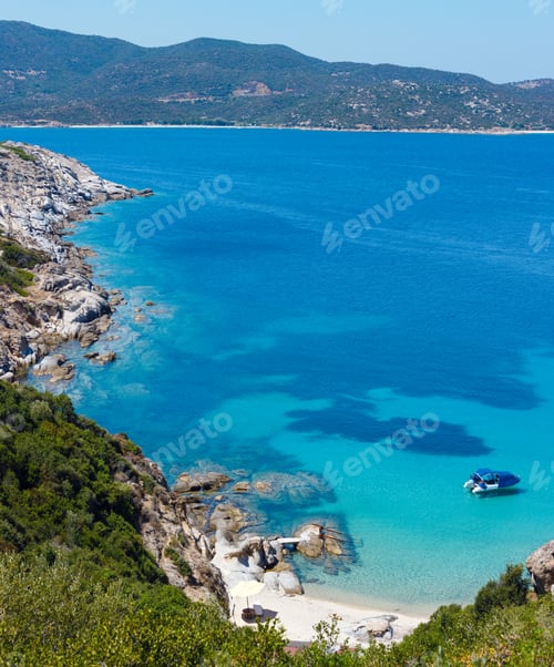 Preview: Summer Sea Scenery With Boat In Aquamarine Transparent Water And Sandy Beach On Rocky Coast. View