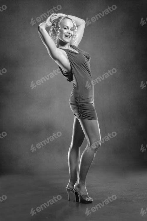 Preview: Active Young Girl With Long Legs On A Blue Background