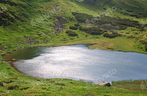 Preview: Patch Of Sunlight On Alpine Lake Nesamovyte Surface (Ukraine, Summer Mountain Chornogora Ridge
