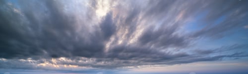 Preview: Fluffy Clouds In Evening Overcast Sky Panoramic View. Climate, Environment And Weather Concept Sky