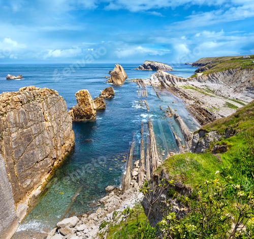 Preview: Arnia Beach (Spain) Atlantic Ocean Coastline Landscape With Cloudy Sky. Two Shots Stitch Image.