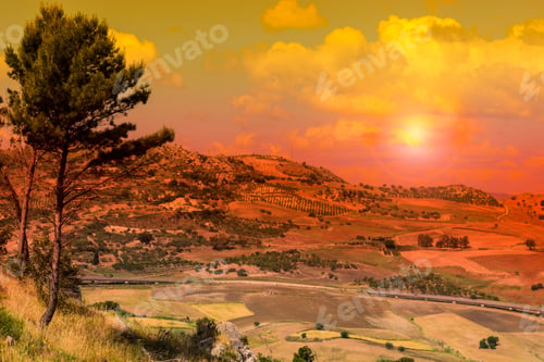 Preview: Landscape Of Sicilian Hills At Sunrise. Asphalt Road Elevated By Columns Due Of Frequent