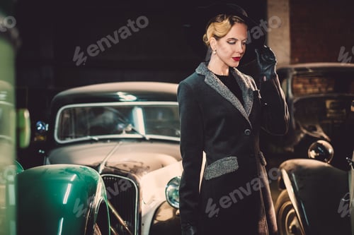 Preview: Woman Among Retro Cars In Garage