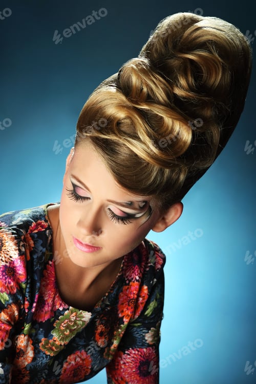 Preview: Woman with Artistic Makeup and Unique Hairstyle