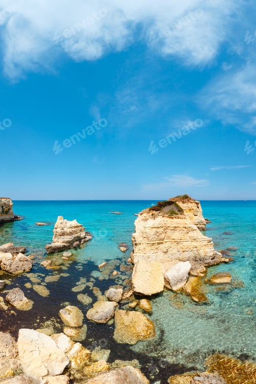 Preview: Picturesque Seascape With White Rocky Cliffs (Faraglioni) At Beach Spiaggia Della Punticeddha