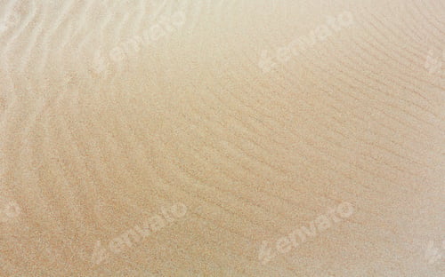 Preview: White Sand Background With Barely Visible Waves After Surf On Beach.