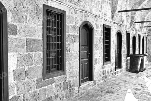 Preview: Arched Gallery Of Mosque Viewed From Paved Courtyard. Doors And Windows In The Old City Of Akko In