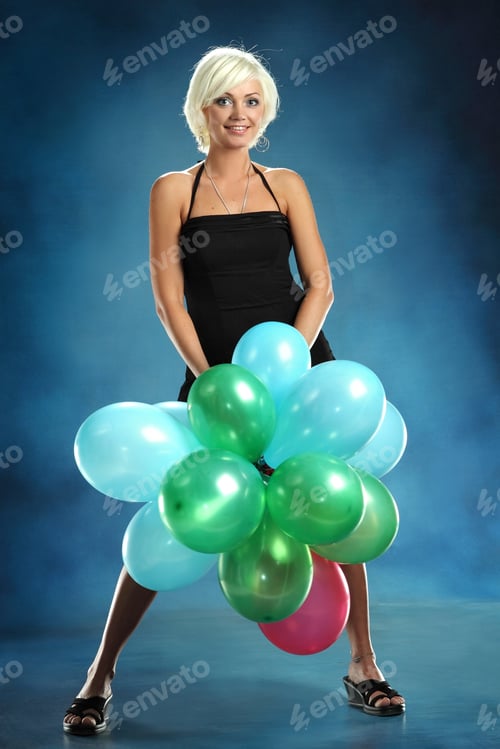 Preview: Beautiful Young Girl With Balloons In The Studio