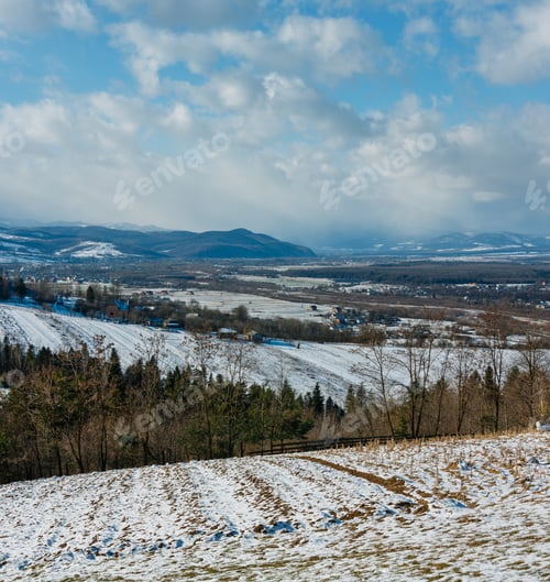 Vista previa: Winter Mountain Landscape With Field On Hill Slope, Birch Grove And Village In Far (Bogorodchany