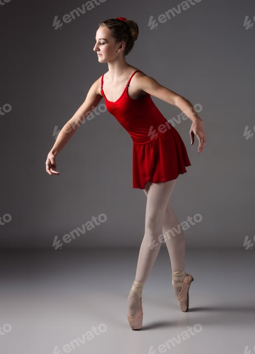 Preview: Ballet Dancer in Red Dress Posing Gracefully
