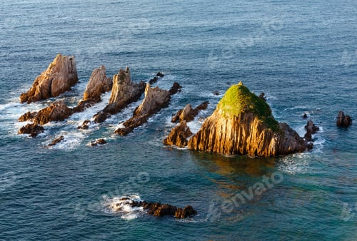 Preview: Sharp Islets Near Gueirua Beach (Asturias, Spain). Evening Atlantic Ocean Landscape.