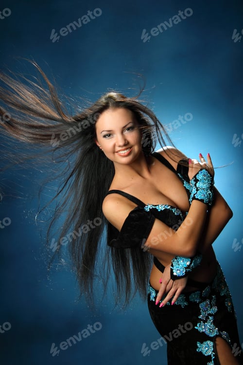 Preview: Beautiful Woman Dancing In Colorful Arabic Dance Costume.Girl In An Blue Dress. Beautiful Brunette