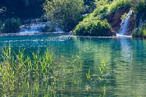 Preview: Beautiful Summer Waterfalls And Lake With Canes In Plitvice Lakes National Park (Croatia)