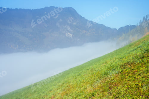 Preview: Sunny Idyllic Autumn Alpine Scene. Peaceful Misty Morning Alps Mountain View From Hiking Path From