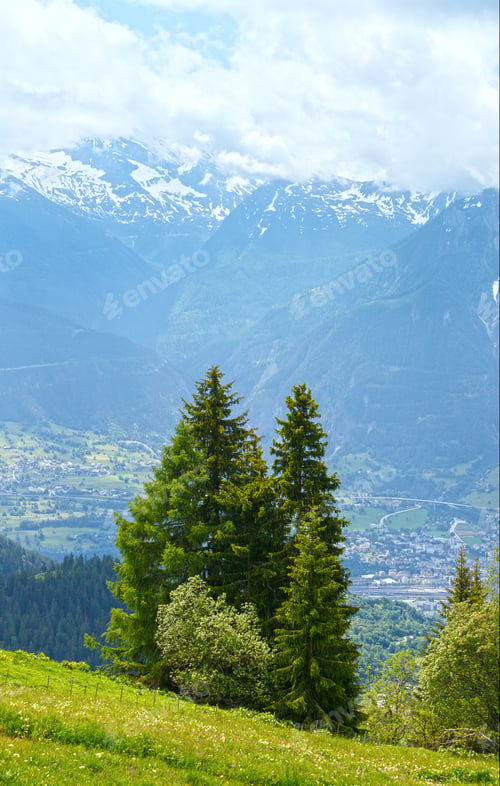 Preview: Summer Mountain Landscape With Snow On Mount Top And Town In Valley (Alps, Switzerland)