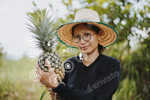 Preview: Young Asian Farmer Show Pineapple.