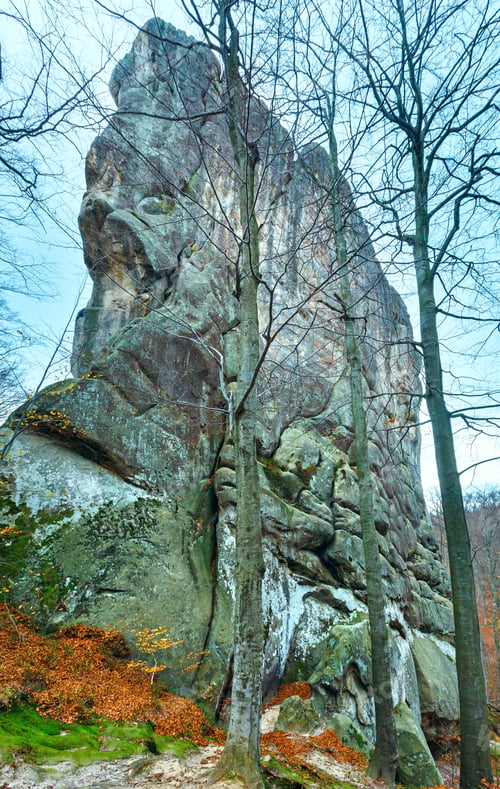 Preview: Large Lofty Stone In Autumn Forest On Sky Background ( "Skeli Dovbusha" , Ivano-Frankovsk Region