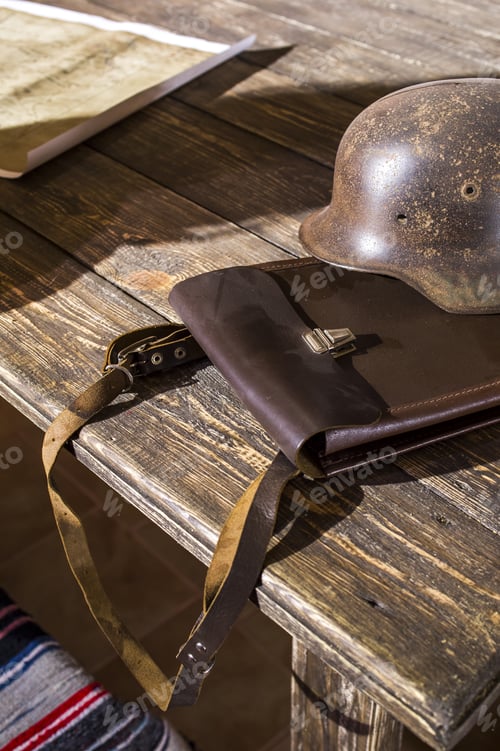 Preview: Military Field Officer Tablet On A Table With A Helmet And A Map