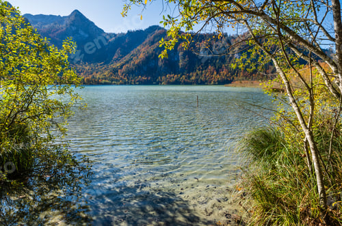 Preview: Sunny Idyllic Colorful Autumn Alpine View. Peaceful Autumn Alps Mountain Lake With Clear