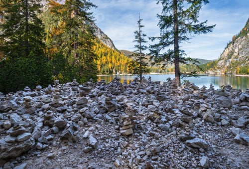 Preview: Small Stone Pyramides Near Autumn Peaceful Alpine Lake Braies Or Pragser Wildsee, South Tyrol