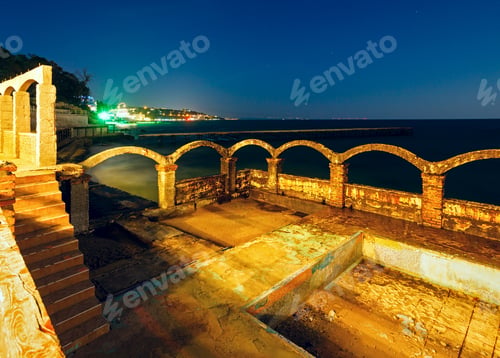 Preview: Summer Coast Night View With Ruin And Varna Town (Black Sea, Bulgaria).