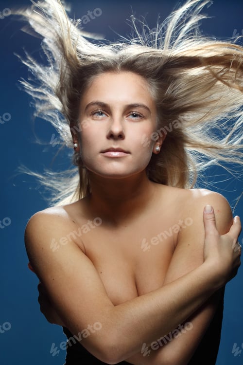 Preview: Red-Haired, Blue-Eyed Girl In An Emotional Flight With The Wind From The Developing Hair