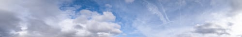 Preview: Fluffy Clouds In The Overcast Sky View. Climate, Environment And Weather Concept Sky Background.