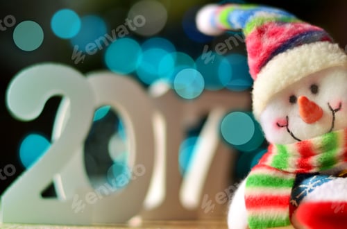 Preview: Christmas Background With Sign 2017 And Snowman On A Blue Background.