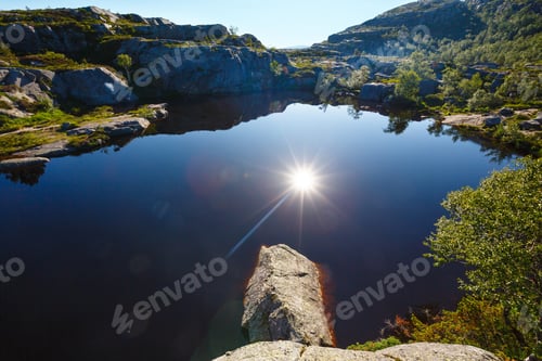 Preview: Deep Blue Small Mountain Norway Lake With Rocky Shore