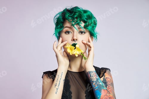 Preview: Woman With Creative Green Coloring Hair And Makeup, Toxic Strands Of Hair. Bright Color Curly Hair