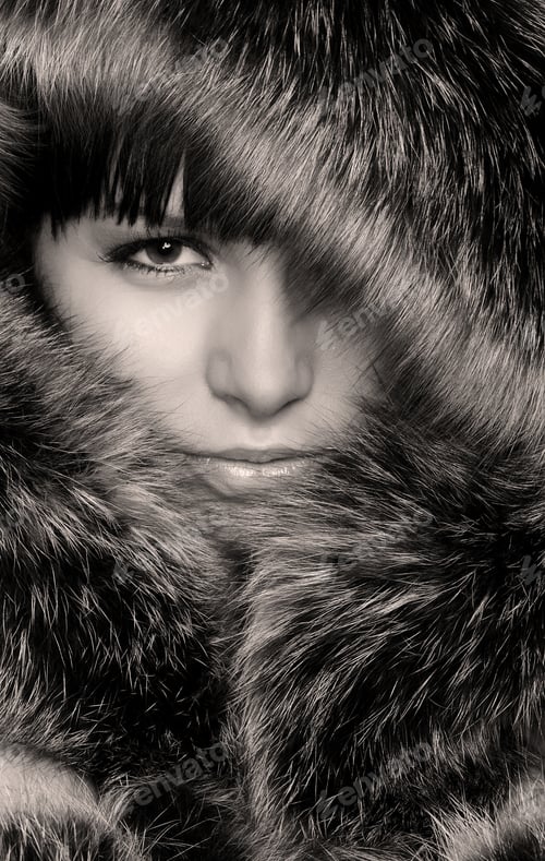 Preview: Smiling Young Woman With A Fur Hood