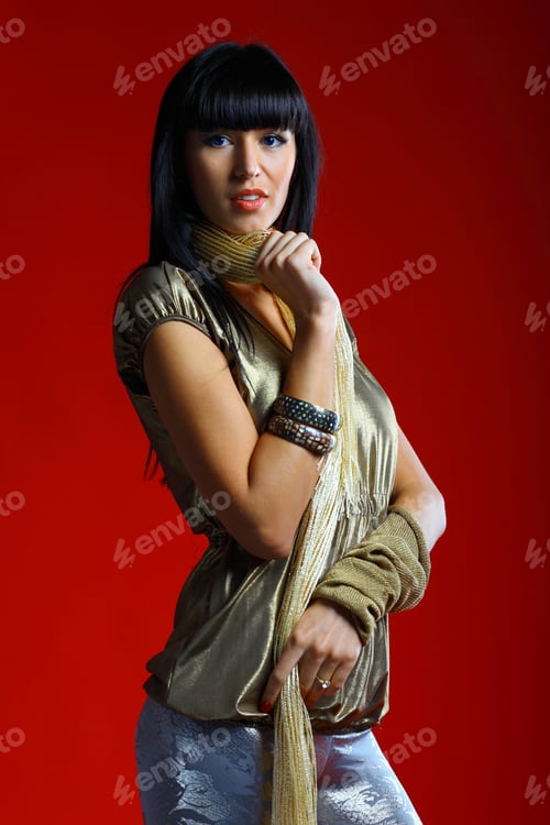 Preview: Beautiful Woman Isolated On A Dark Red