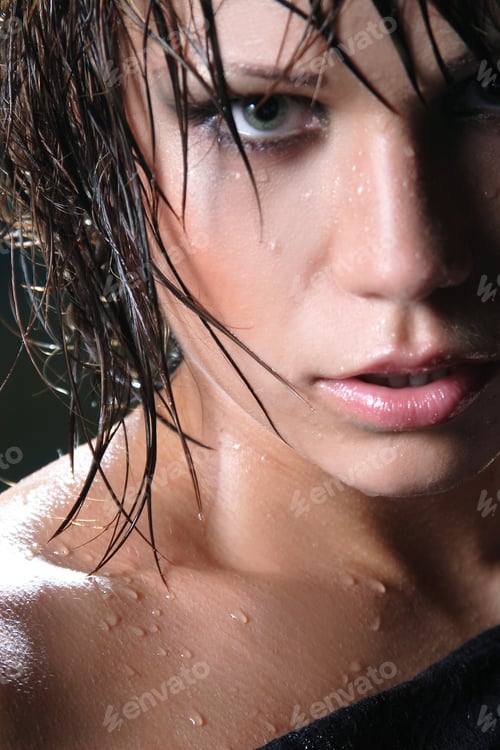 Preview: Portrait Of A Beautiful Young Woman With Wet Hair