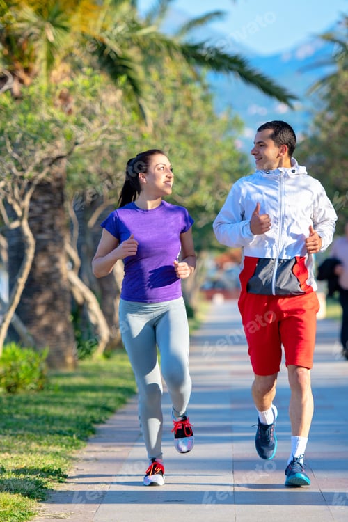 Preview: Urban Sports, Healthy Young Couple Jogging In The City At Sunny Morning