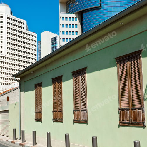 Preview: Old Houses After Reconstruction In Tel Aviv On The Background Of The Modern Building